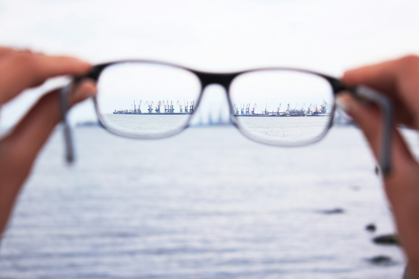 Glasses focusing on the coastline